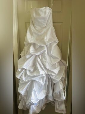 White Ruffled sleeveless Wedding Dress or Ball Gown